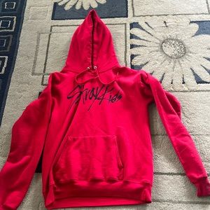 This sweatshirt is from the K-pop band stray kids it is red it’s a size small.